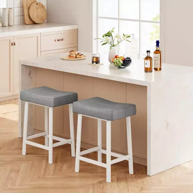 Whizmax 24 Inch Backless Saddle Barstools Set of 2, Counter Height Upholstered Padded Barstools with Curved Surface, Metal Leg and Footrest