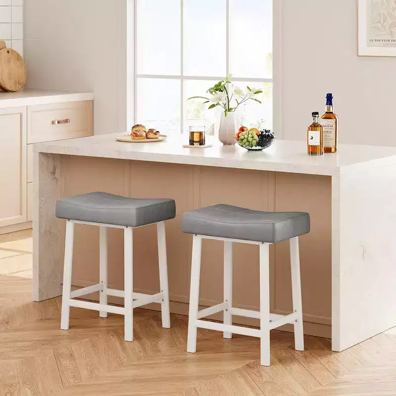 Whizmax 24 Inch Backless Saddle Barstools Set of 2, Counter Height Upholstered Padded Barstools with Curved Surface, Metal Leg and Footrest